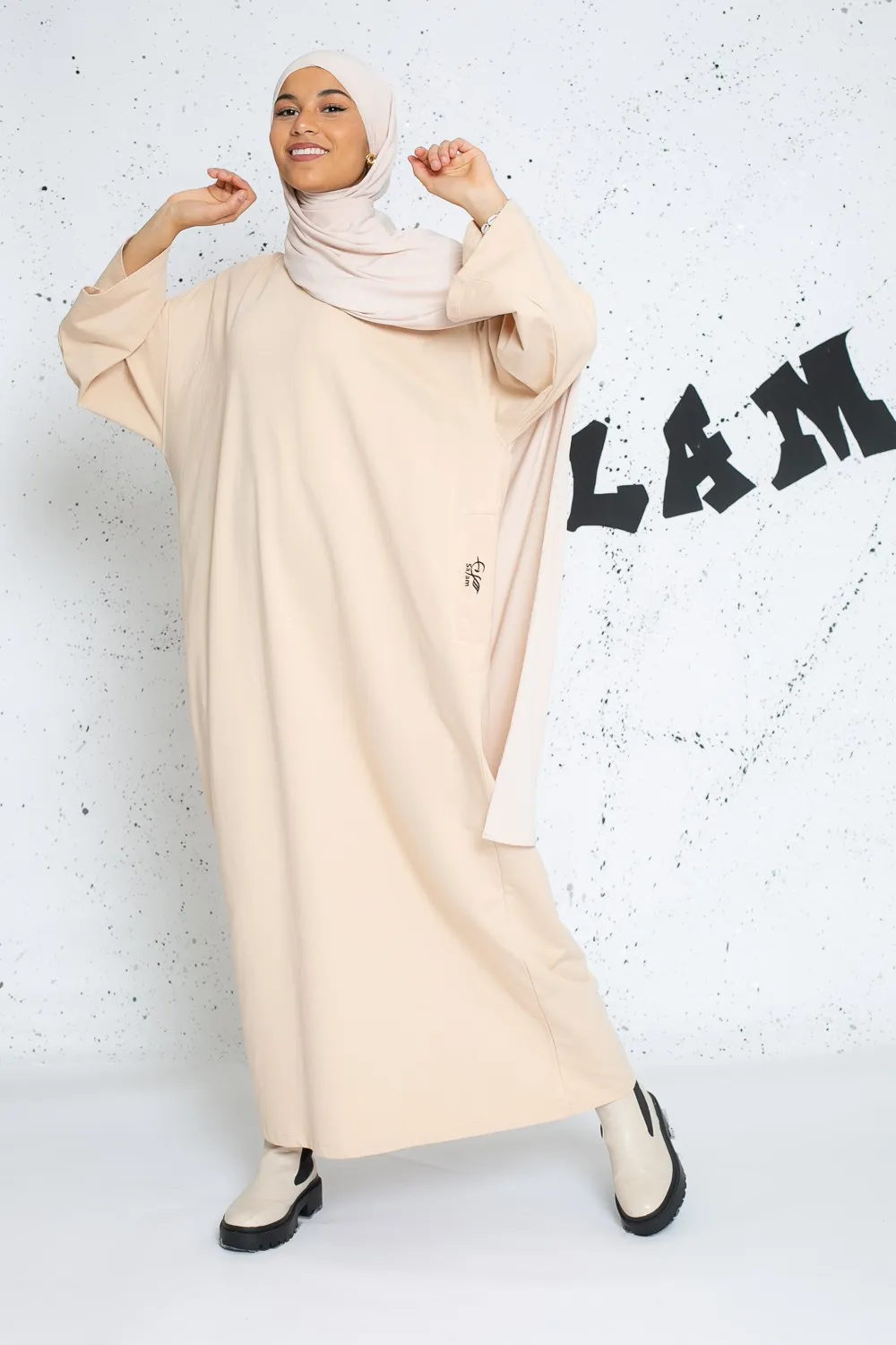 Vestido sudadera oversize beige manga ancha