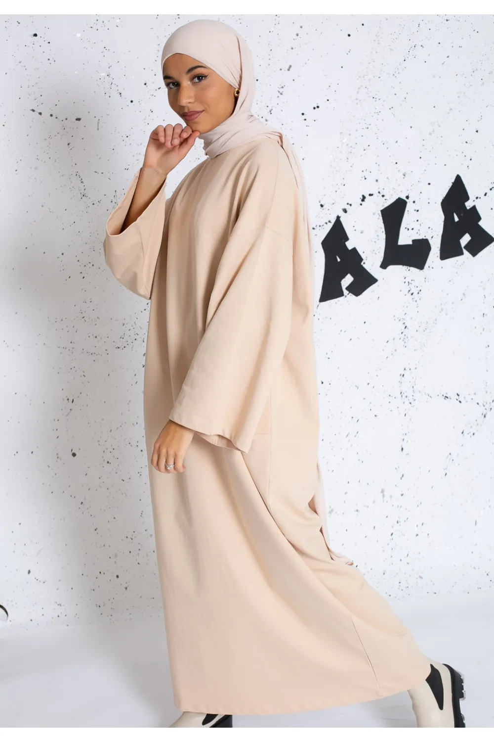 Vestido sudadera oversize beige manga ancha